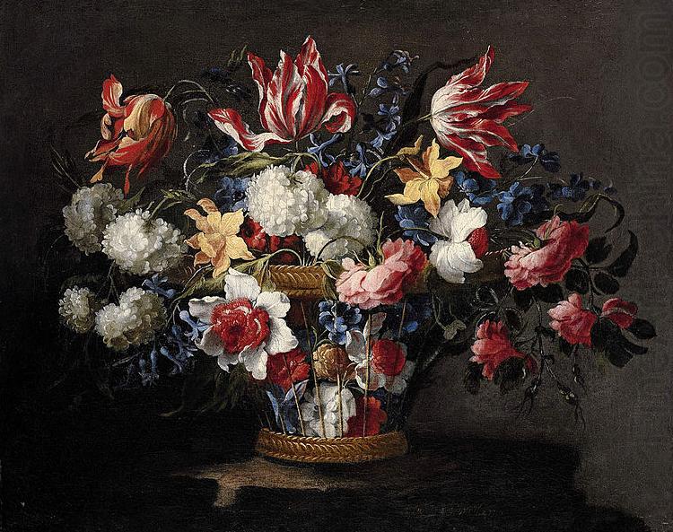 Juan de Arellano roses and other flowers in a wicker basket on a ledge